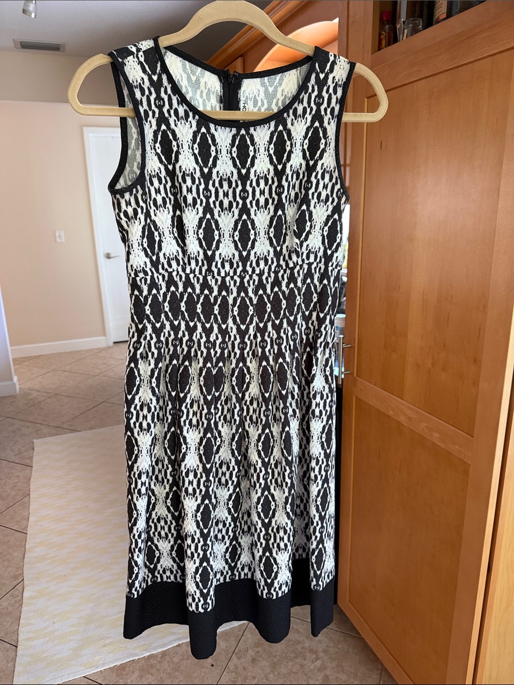 Nora Noh Black and White Sleeveless Midi Dress with Textured Pattern
